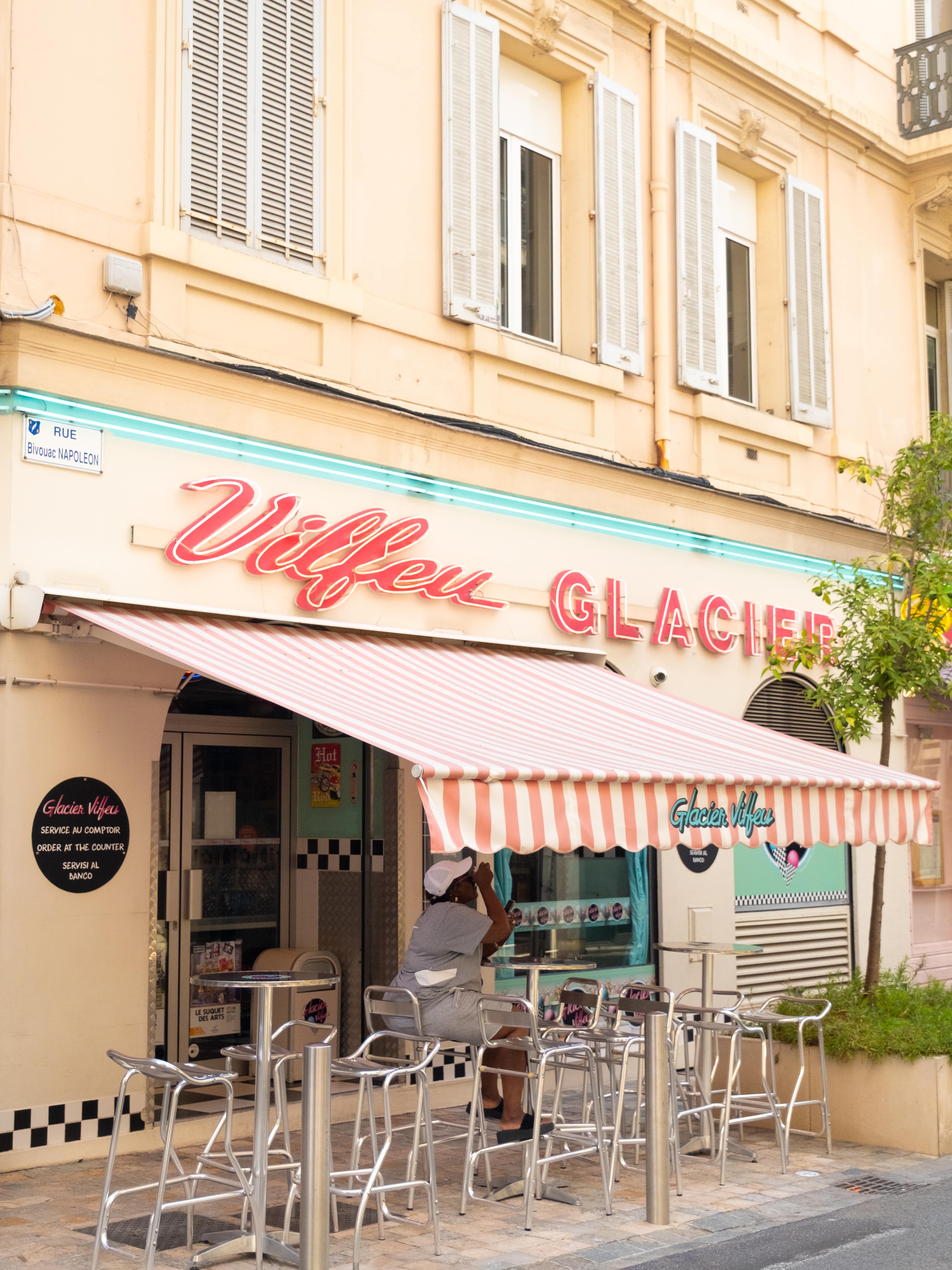 Woman enjoying the last sip of her icecream cup in Cannes, France, taken with the Fujifilm X-T4 camera, by Isabel Dröge